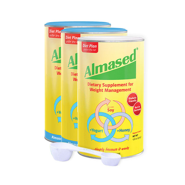 pack of 3 cans of almased and a spoon